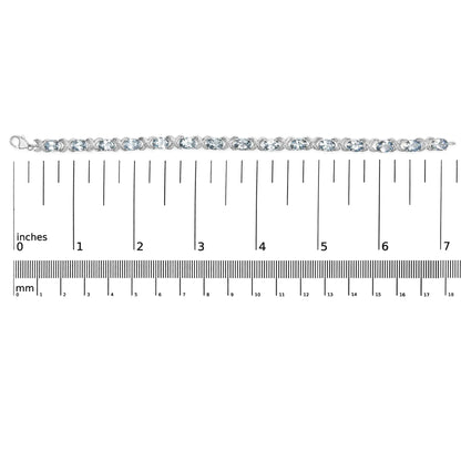 Style Loft Collection .925 Sterling Silver 16.0 Ctw Oval Blue Topaz and Diamond Accent Tennis X Link Bracelet (I-J Color, I1-I2 Clarity) - Size 7" Inch