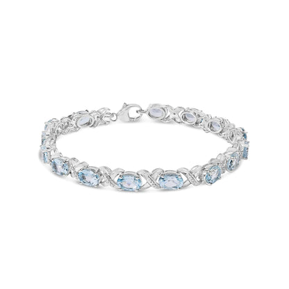 Style Loft Collection .925 Sterling Silver 16.0 Ctw Oval Blue Topaz and Diamond Accent Tennis X Link Bracelet (I-J Color, I1-I2 Clarity) - Size 7" Inch