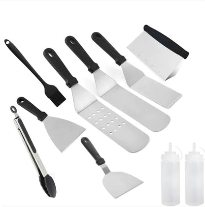 Set of kitchen utensils including spatulas and a tong on a white background